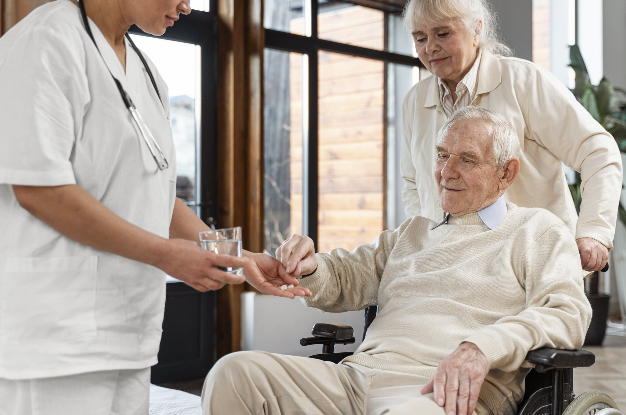 nursing-home-doctor-giving-pills